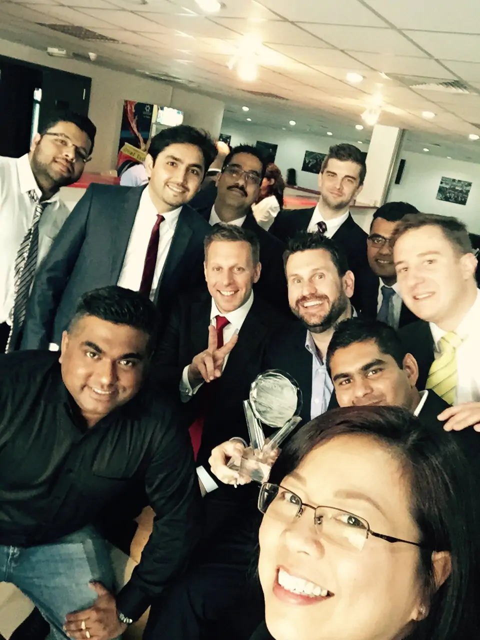 Xeratek team selfie with award trophy