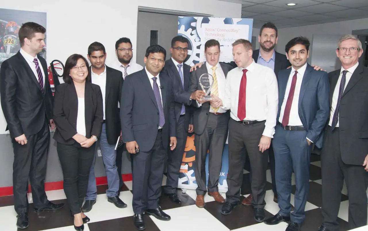 Team receiving Xerox partner award